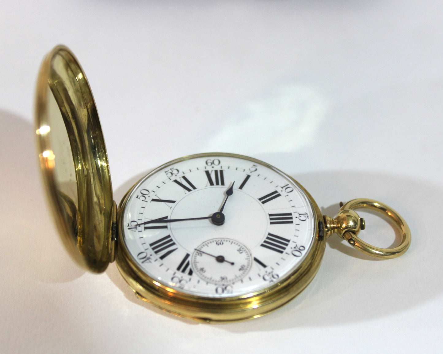 Reloj de bolsillo Maurice Genève en oro con su llave