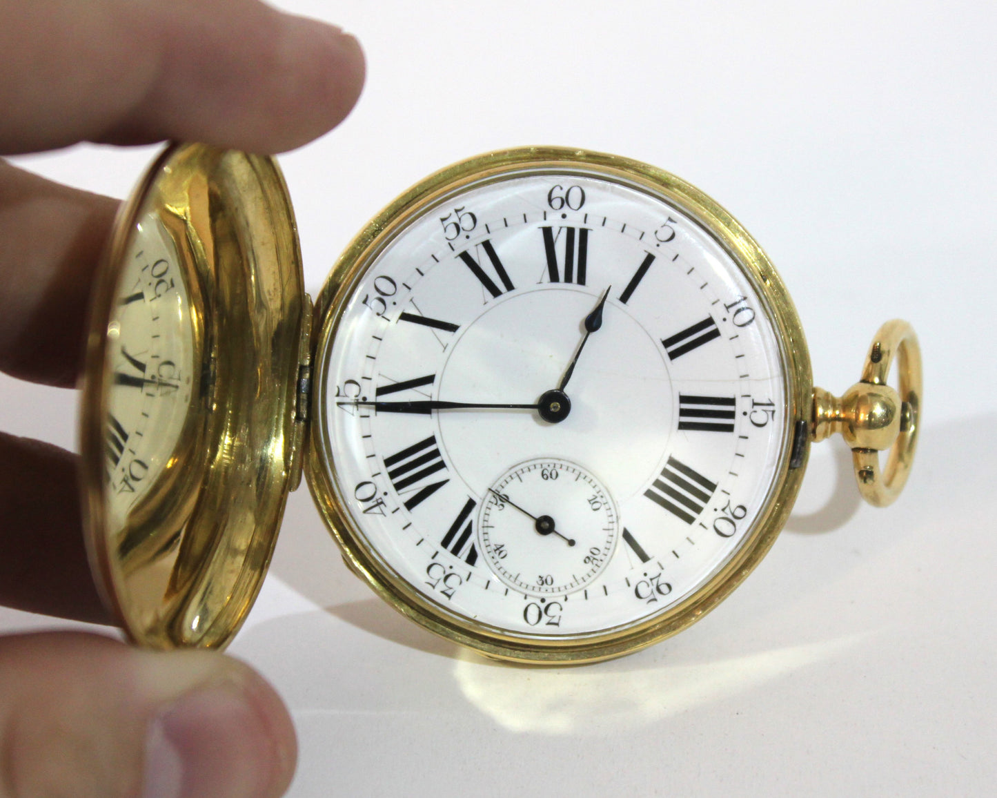 Reloj de bolsillo Maurice Genève en oro con su llave