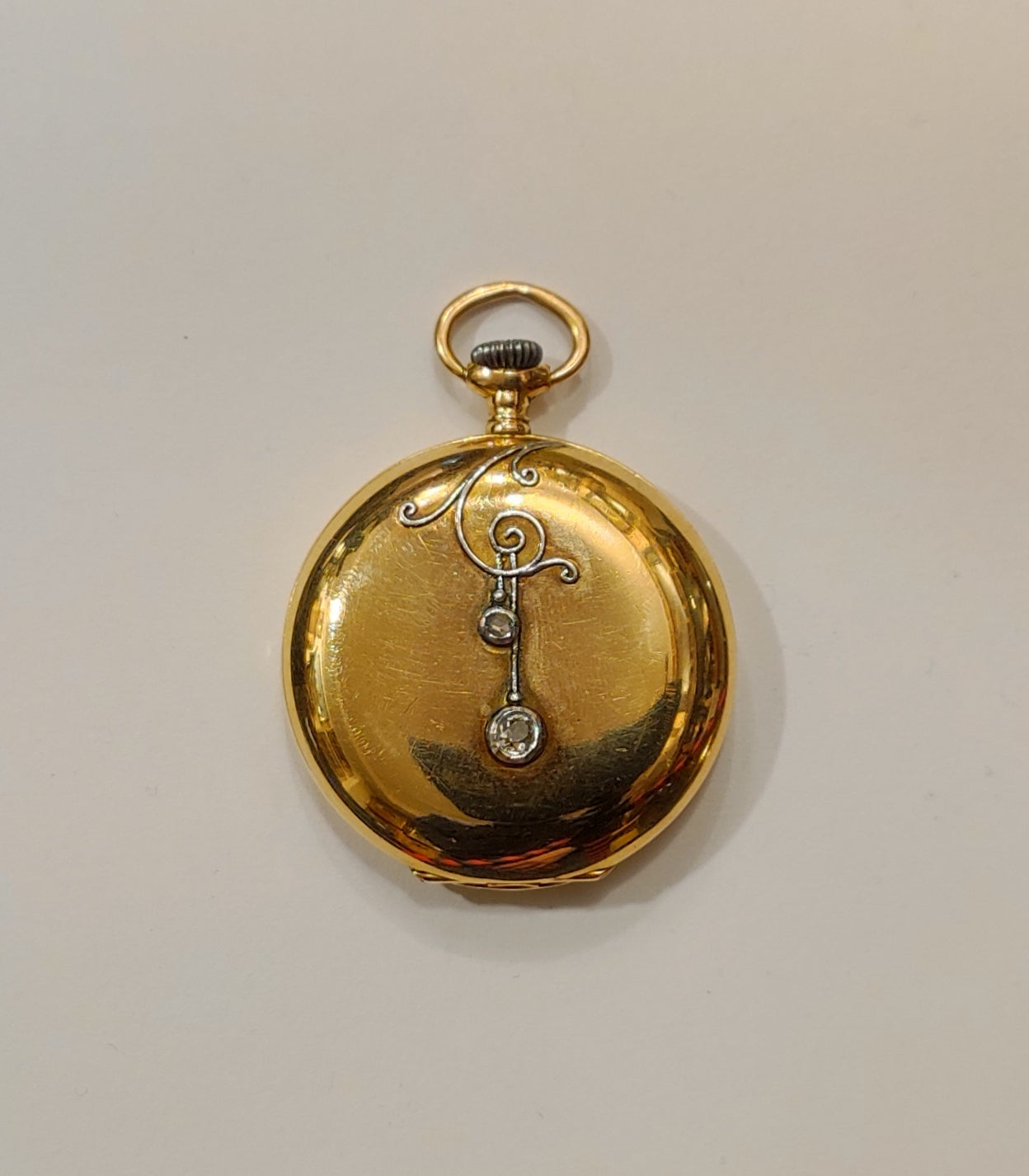 Reloj bolsillo en oro brillantes – Jorge Mashini Antigüedades