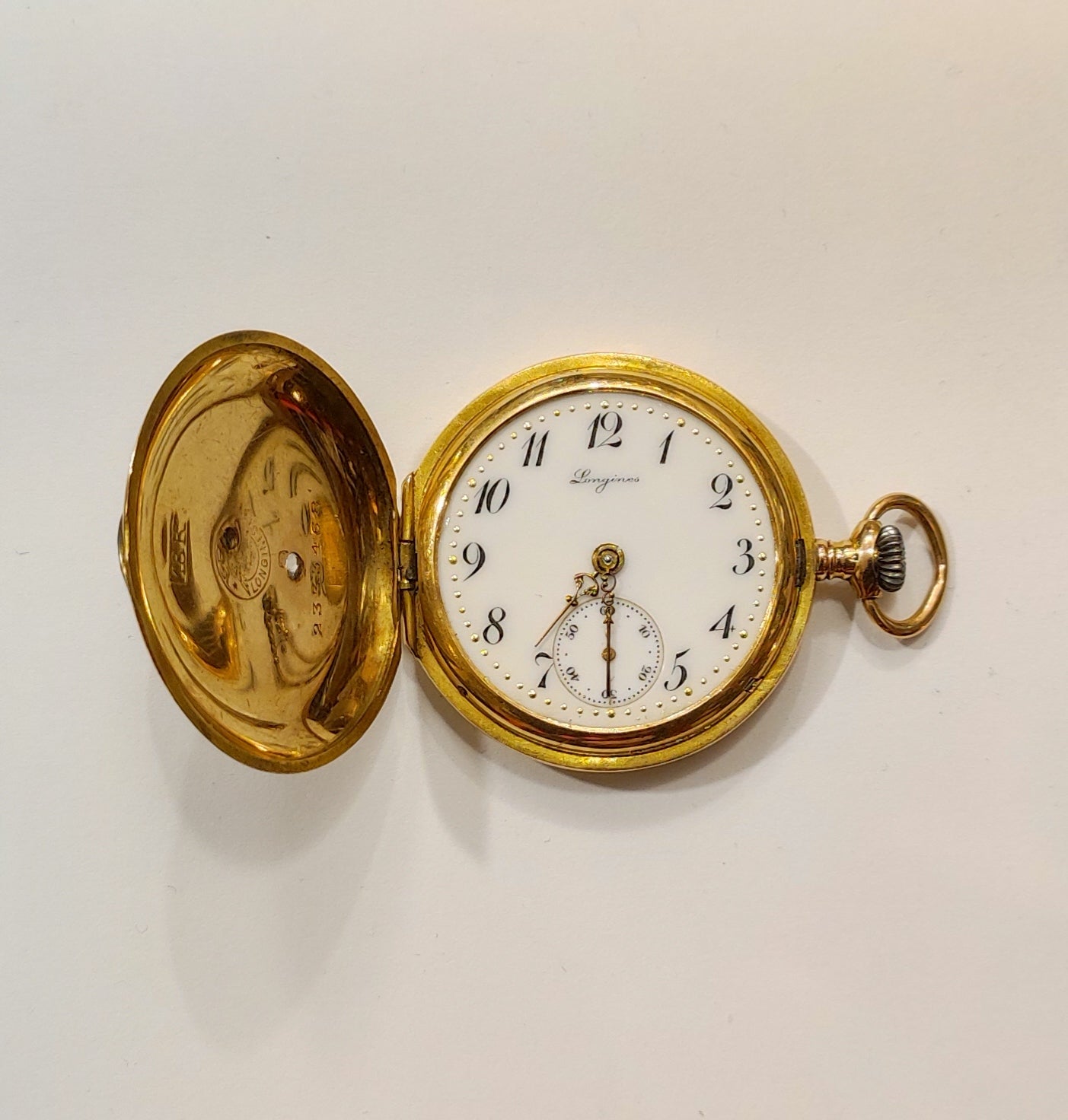 Reloj de bolsillo Longines en oro con brillantes