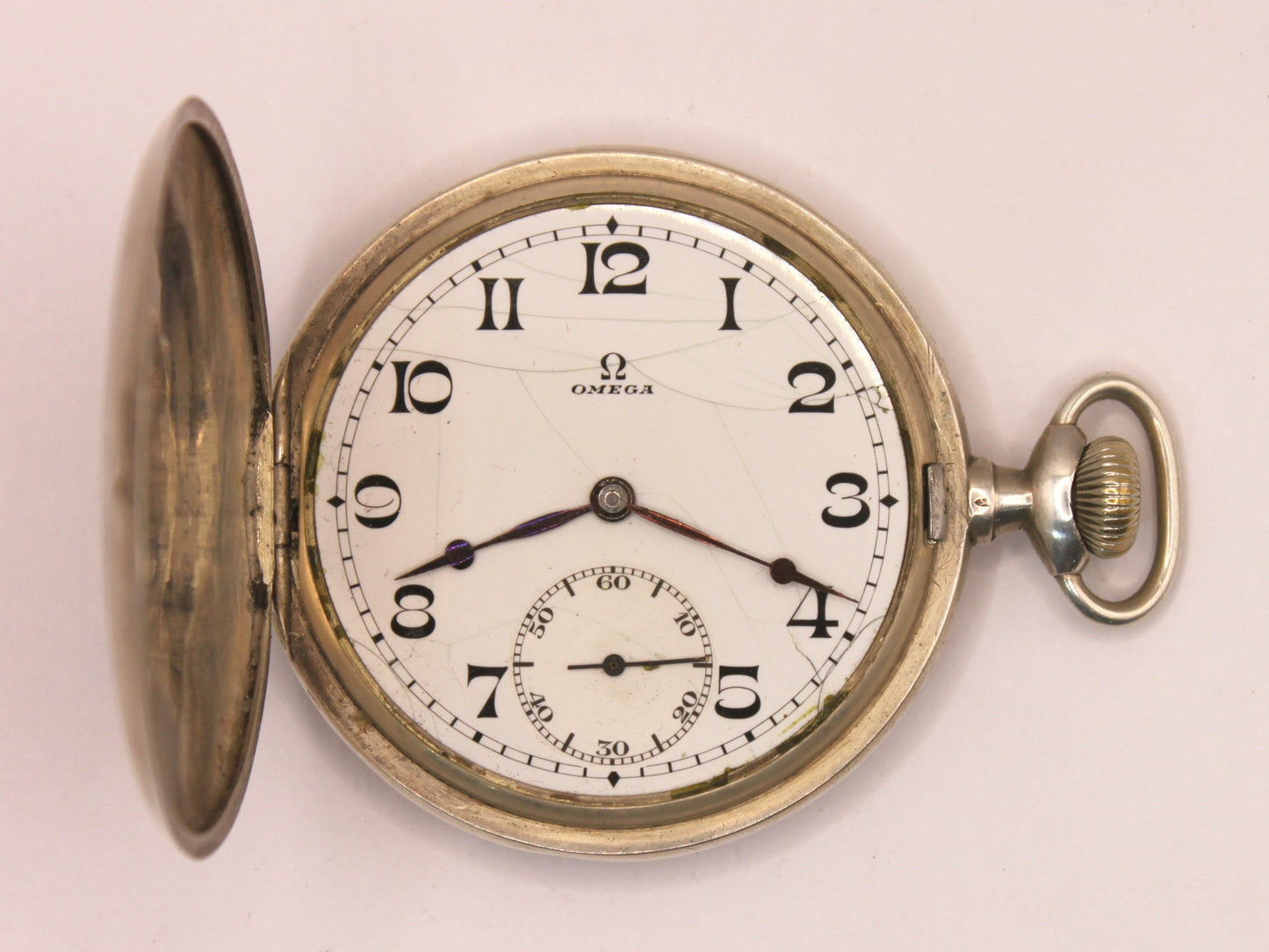 Reloj de bolsillo Omega en plata con su caja