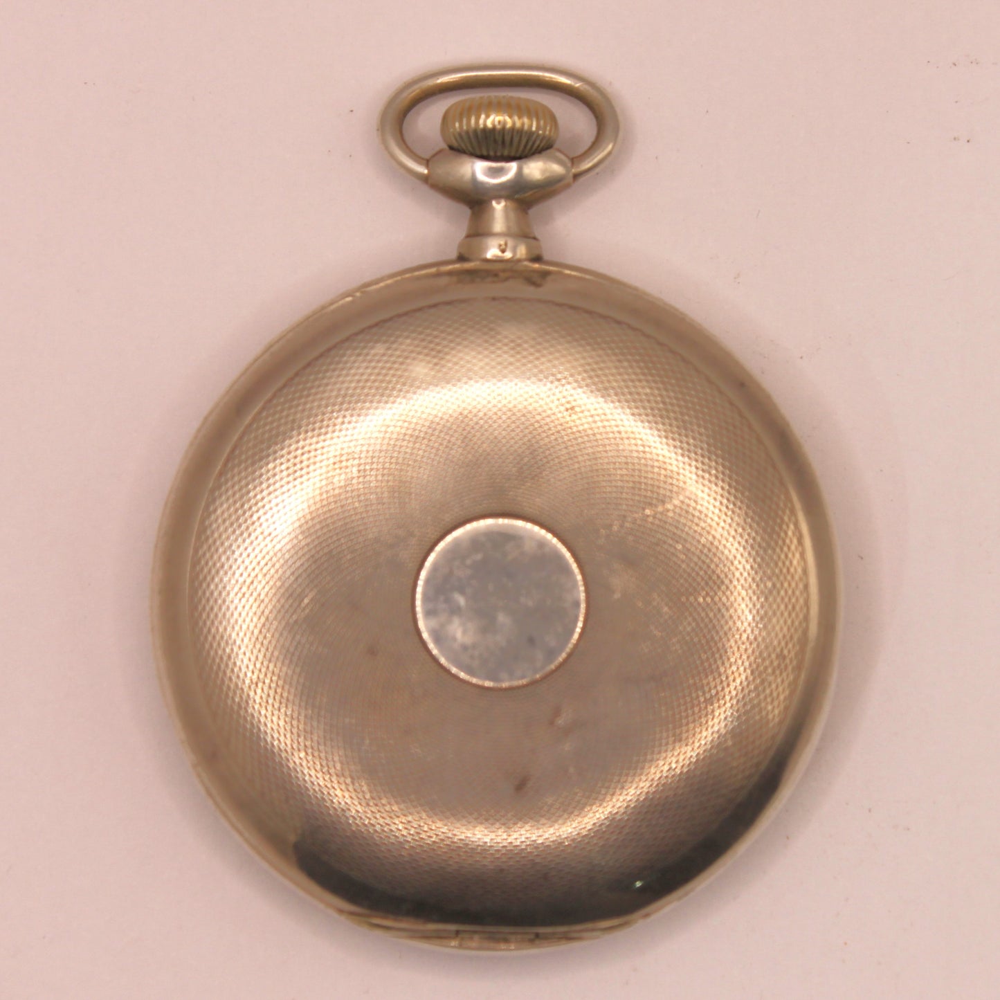 Reloj de bolsillo Omega en plata con su caja