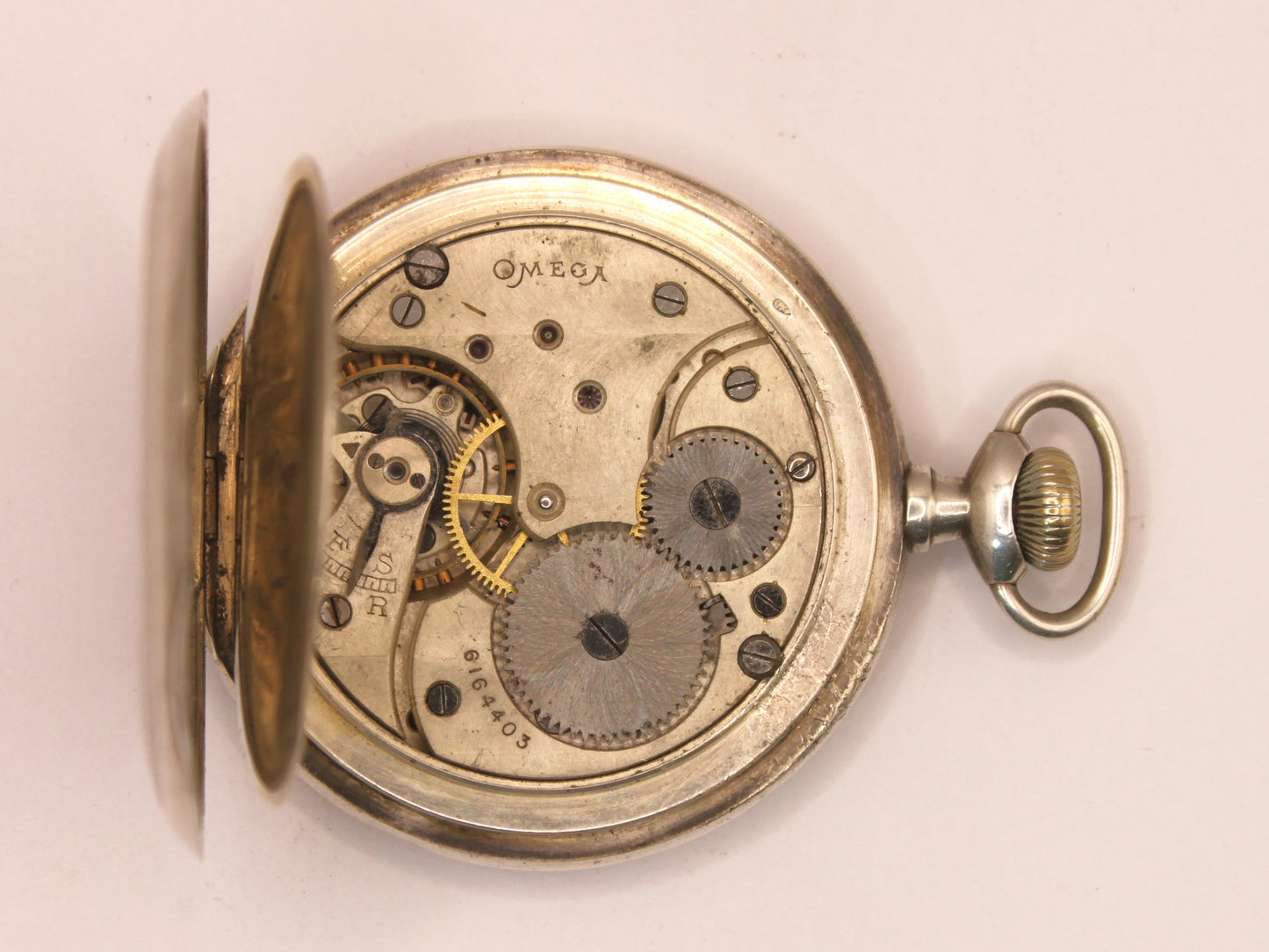 Reloj de bolsillo Omega en plata con su caja