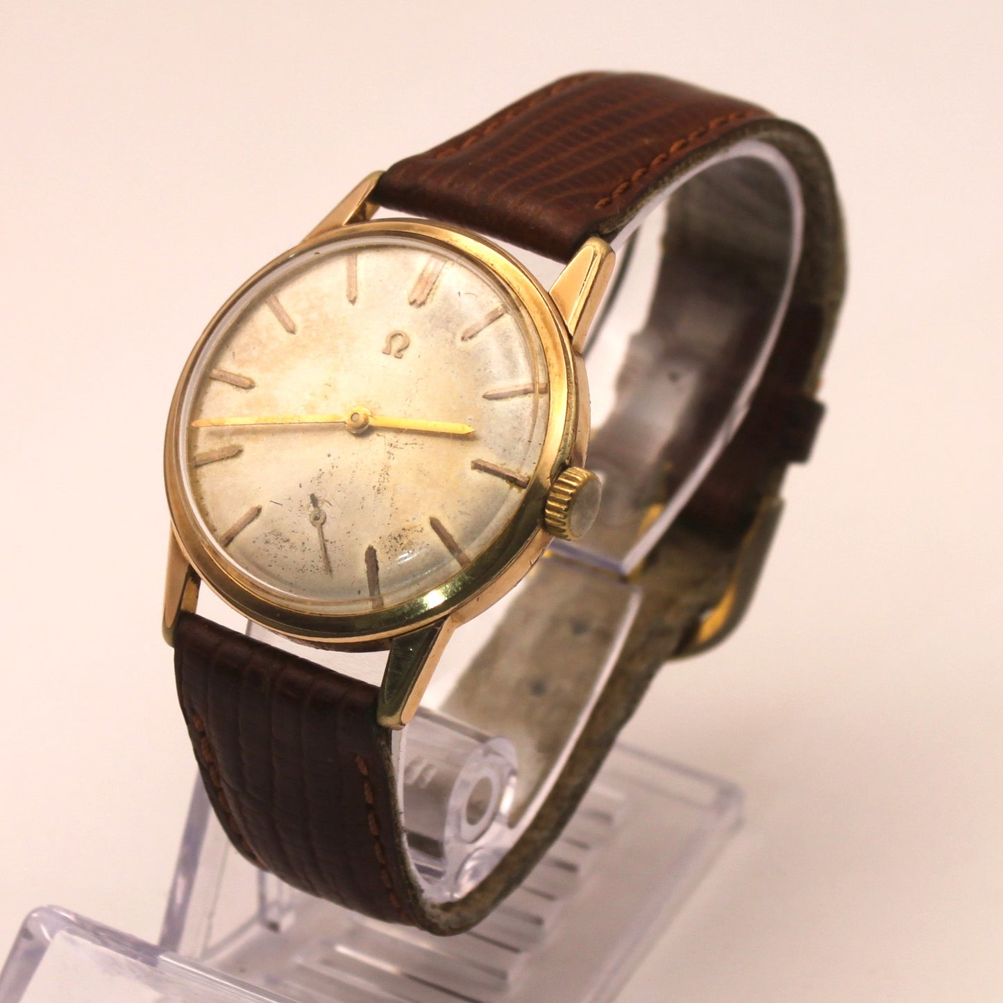 Reloj de pulsera Omega dorado (correa marrón)