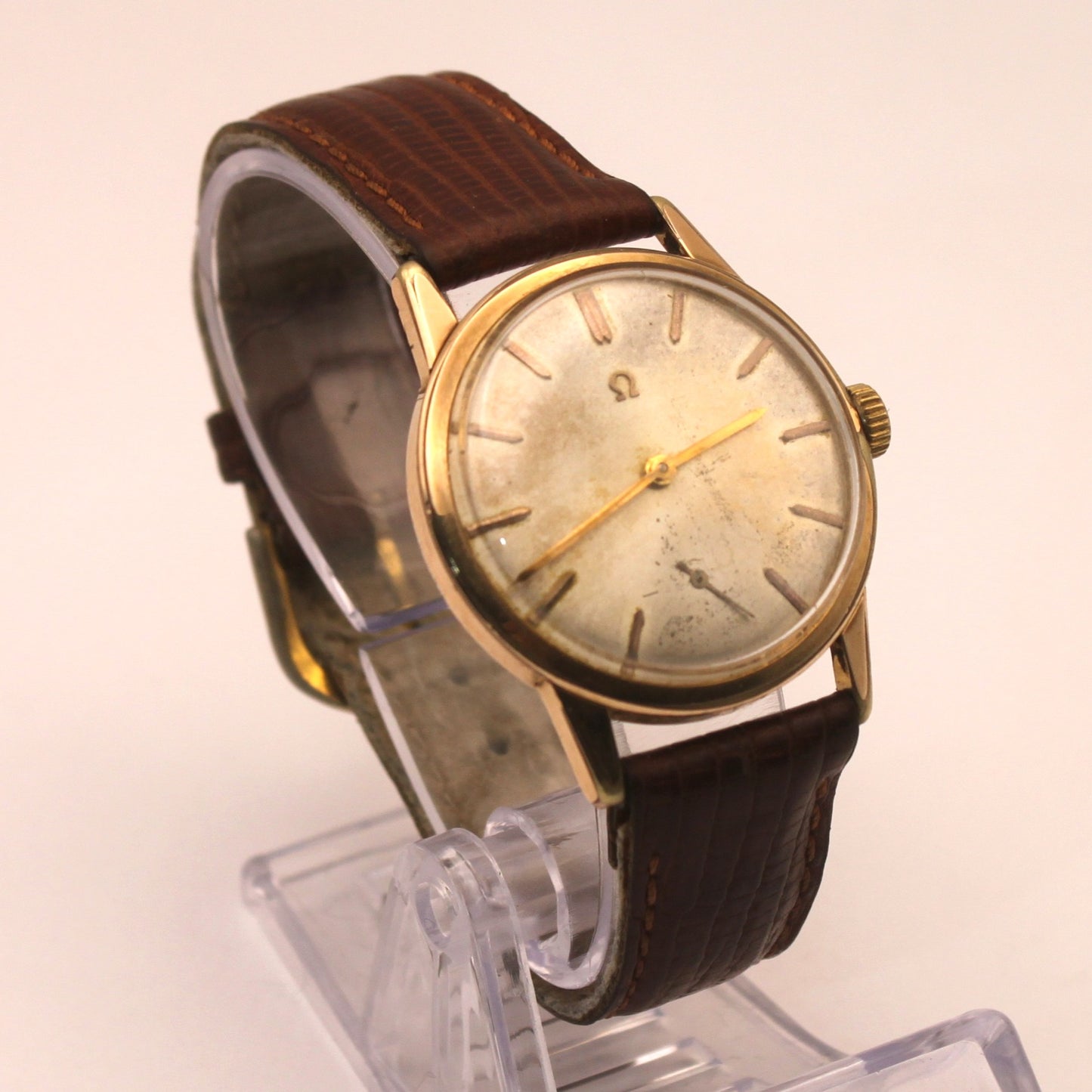 Reloj de pulsera Omega dorado (correa marrón)