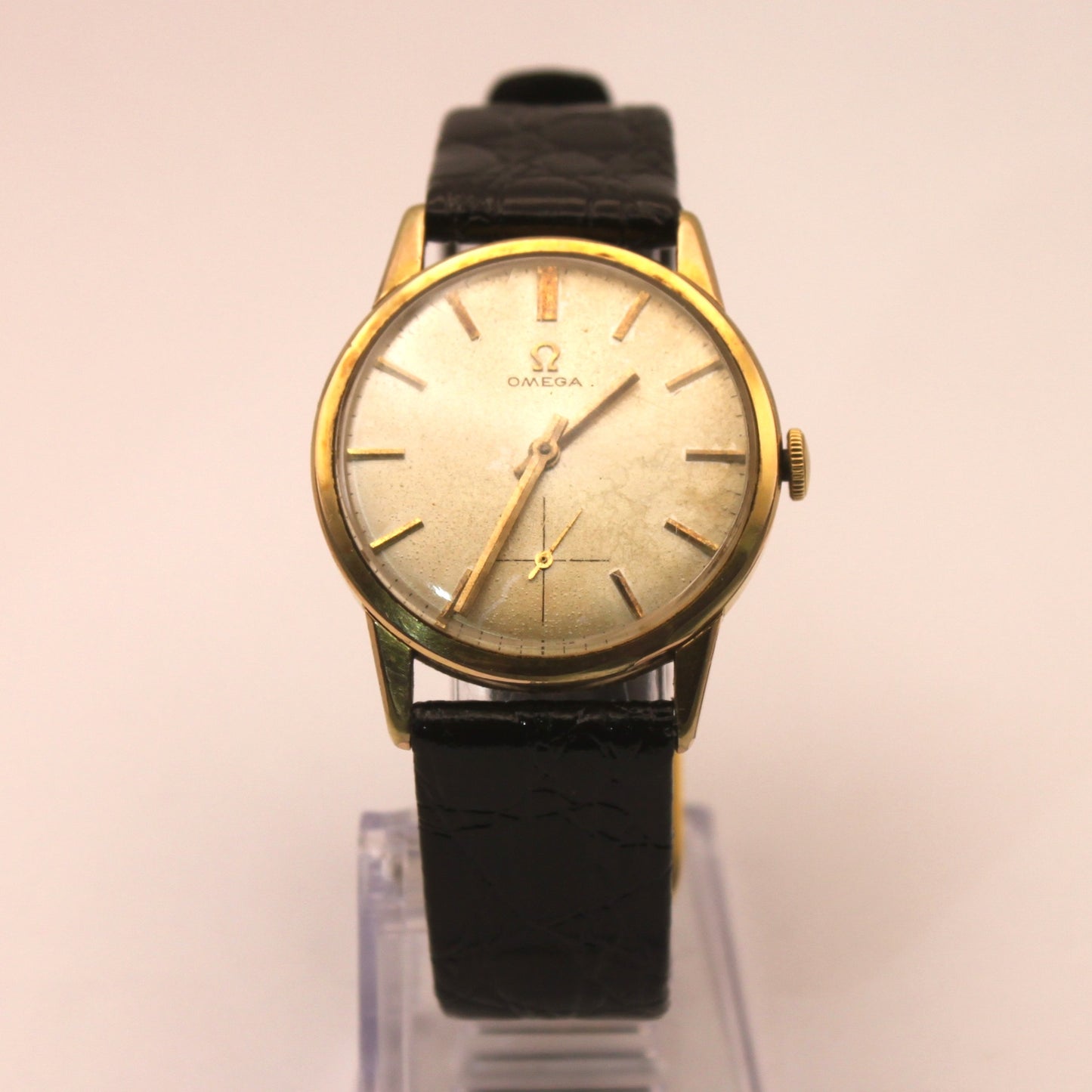 Reloj de pulsera Omega dorado (correa negra)