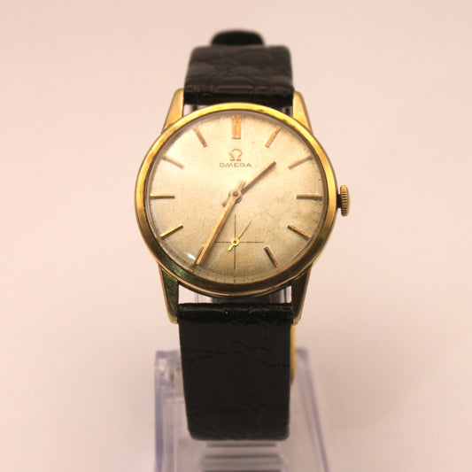 Reloj de pulsera Omega dorado (correa negra)
