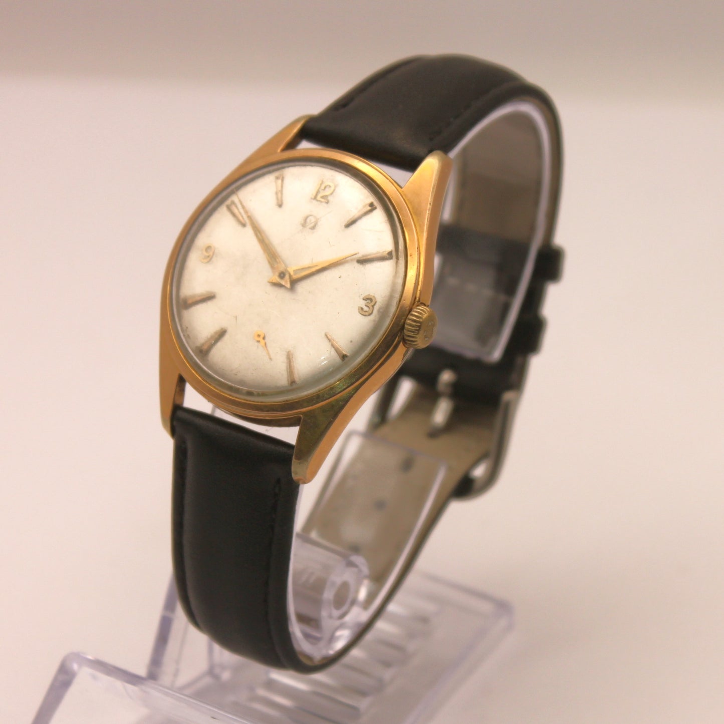 Reloj de pulsera Omega dorado (correa negra)