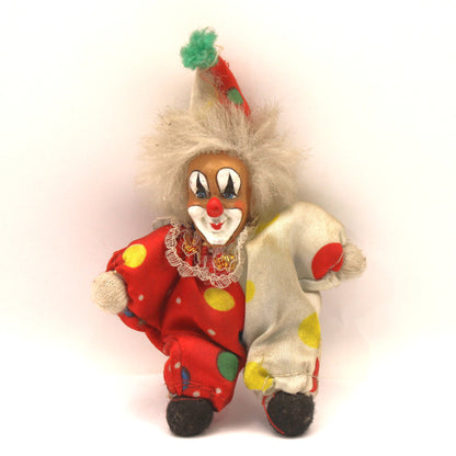 Payasito embrujado de porcelana y tela