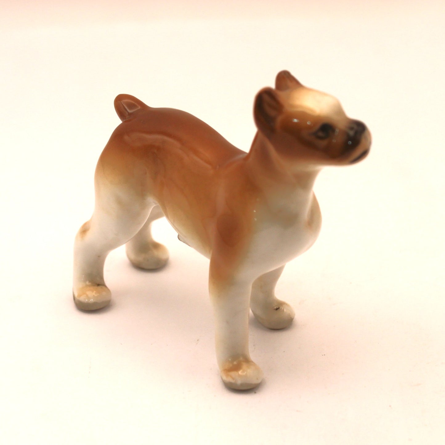Bóxer de porcelana en miniatura (escultura)