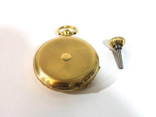 Reloj de bolsillo Robert Roskell en oro con su llave