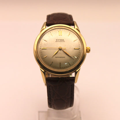 Reloj de pulsera Cyma Watersport en oro – Jorge Mashini Antigüedades